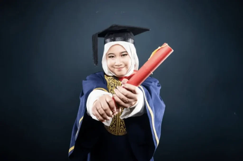 Graduate holding a certificate at a university ceremony